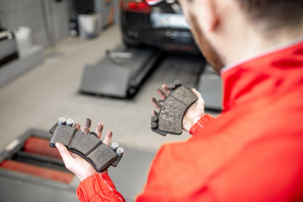 Holding brake pads at the car service