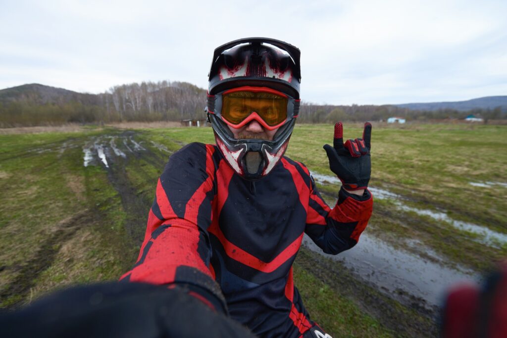 Motorcross rider posing for selfie
