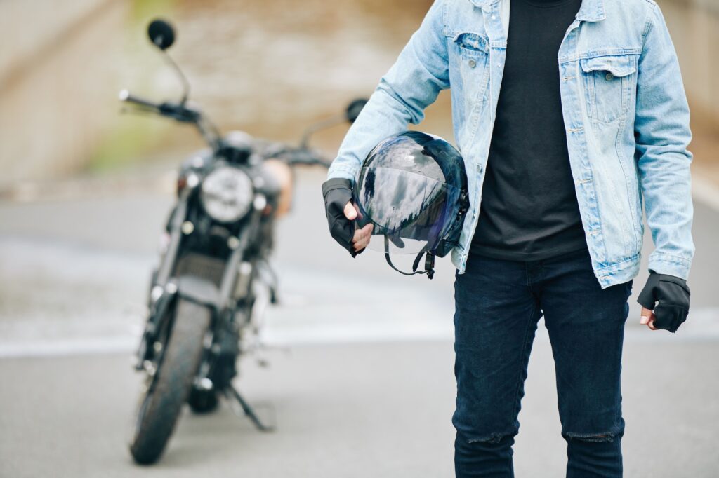 Motorcyclist with helmet