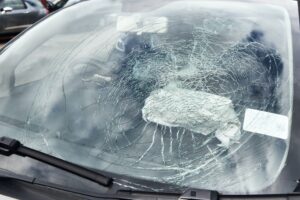 Close Up Of Smashed Windscreen On Vandalised Car